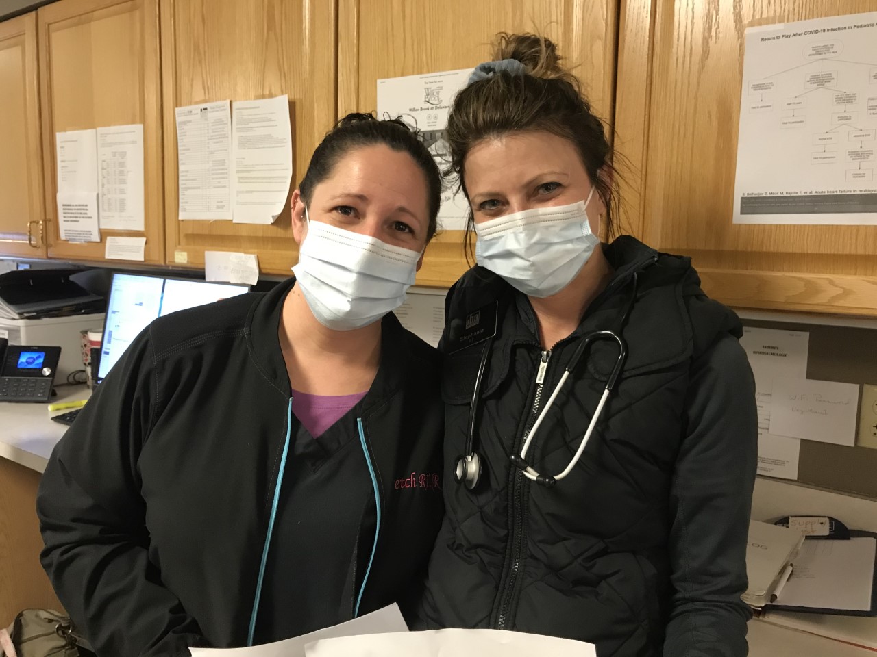 two urgent care employees